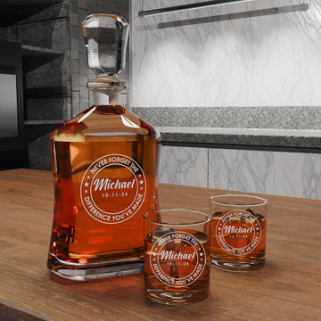 Personalized glass decanter and two matching whiskey glasses engraved for Michael with the message Never Forget the Difference You've Made.
