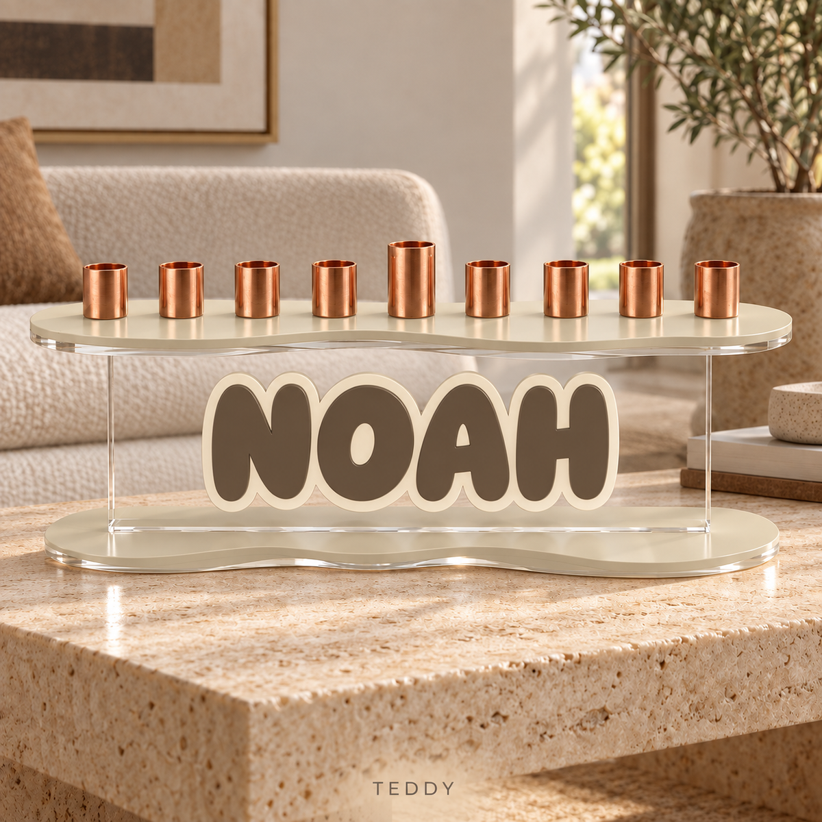 NOAH modern menorah in Teddy, with Linen curved plates and layered Milk Chocolate letters outlined in Eggshell on travertine