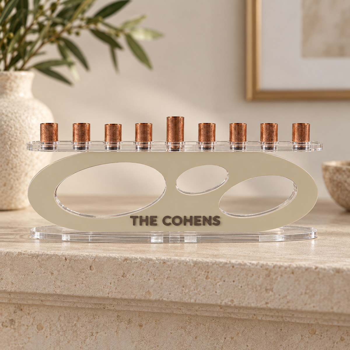 THE COHENS personalized Forma menorah in Linen with Milk Chocolate lettering, clear oval base and copper candle cups