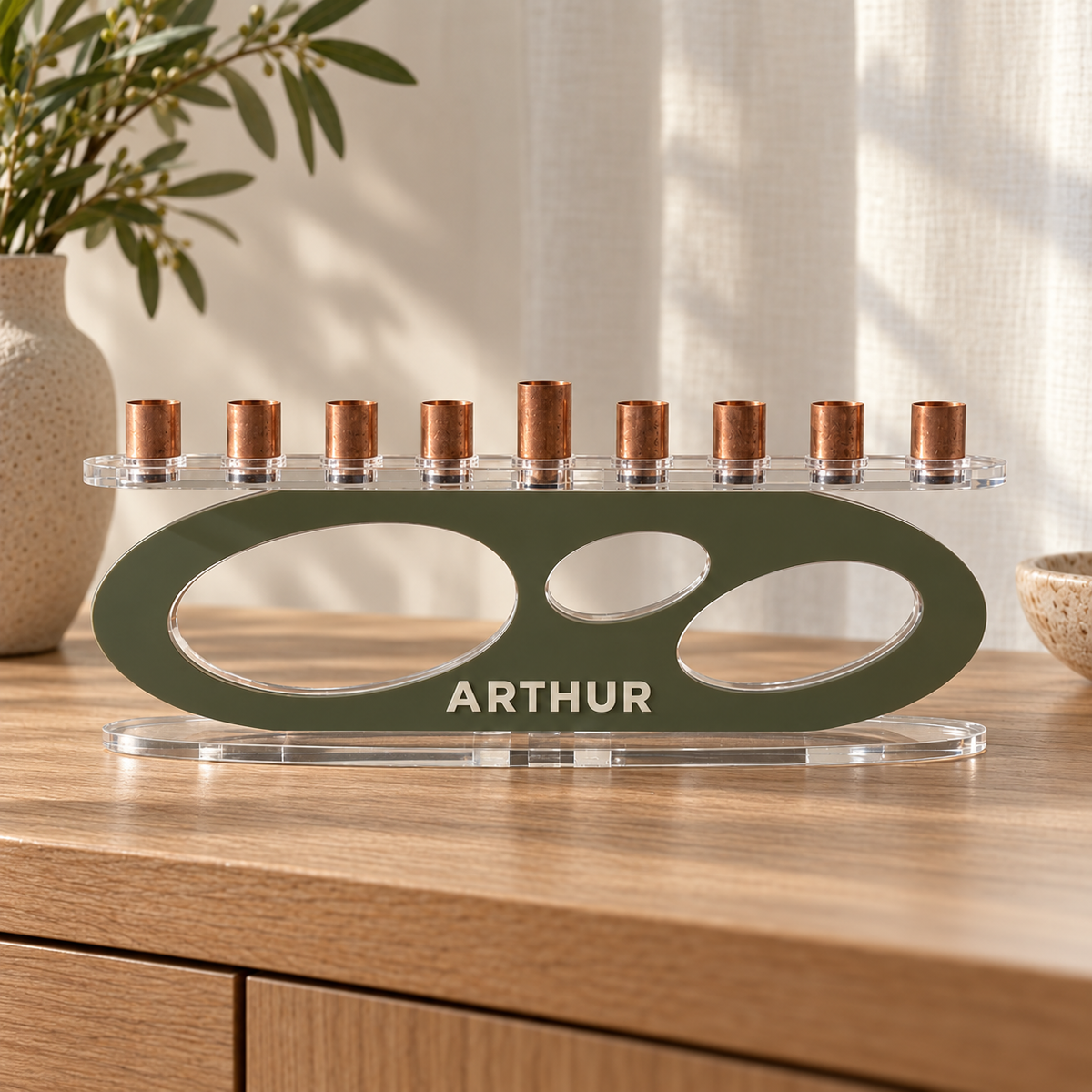 ARTHUR personalized Forma menorah in Sage with Eggshell lettering, clear oval base and copper candle cups