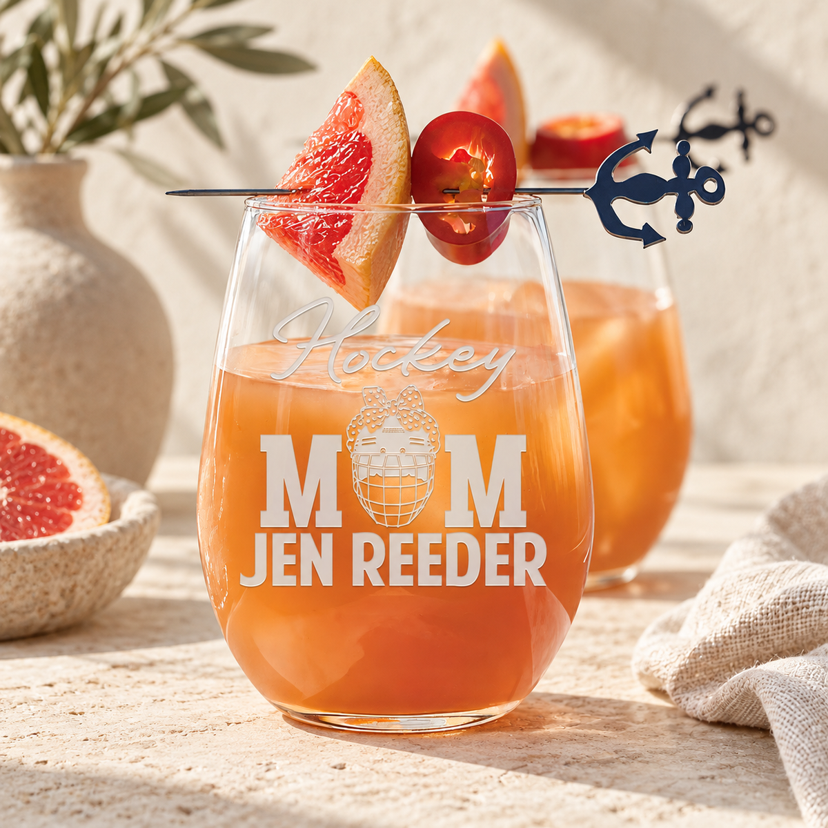 Personalized Stemless Wine Glass - "Hockey Mom" — editorial product photograph