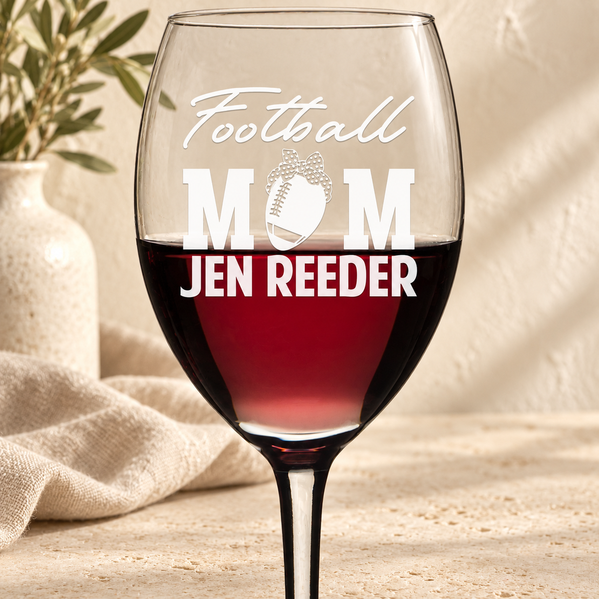 Personalized Wine Glass - "Football Mom" — editorial product photograph