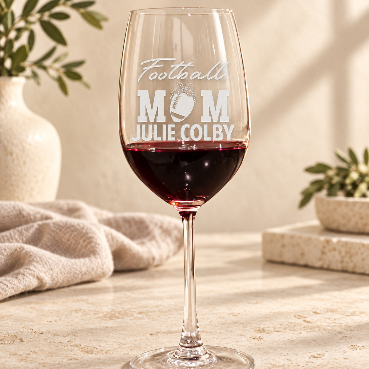 Personalized Wine Glass - "Football Mom" — editorial product photograph