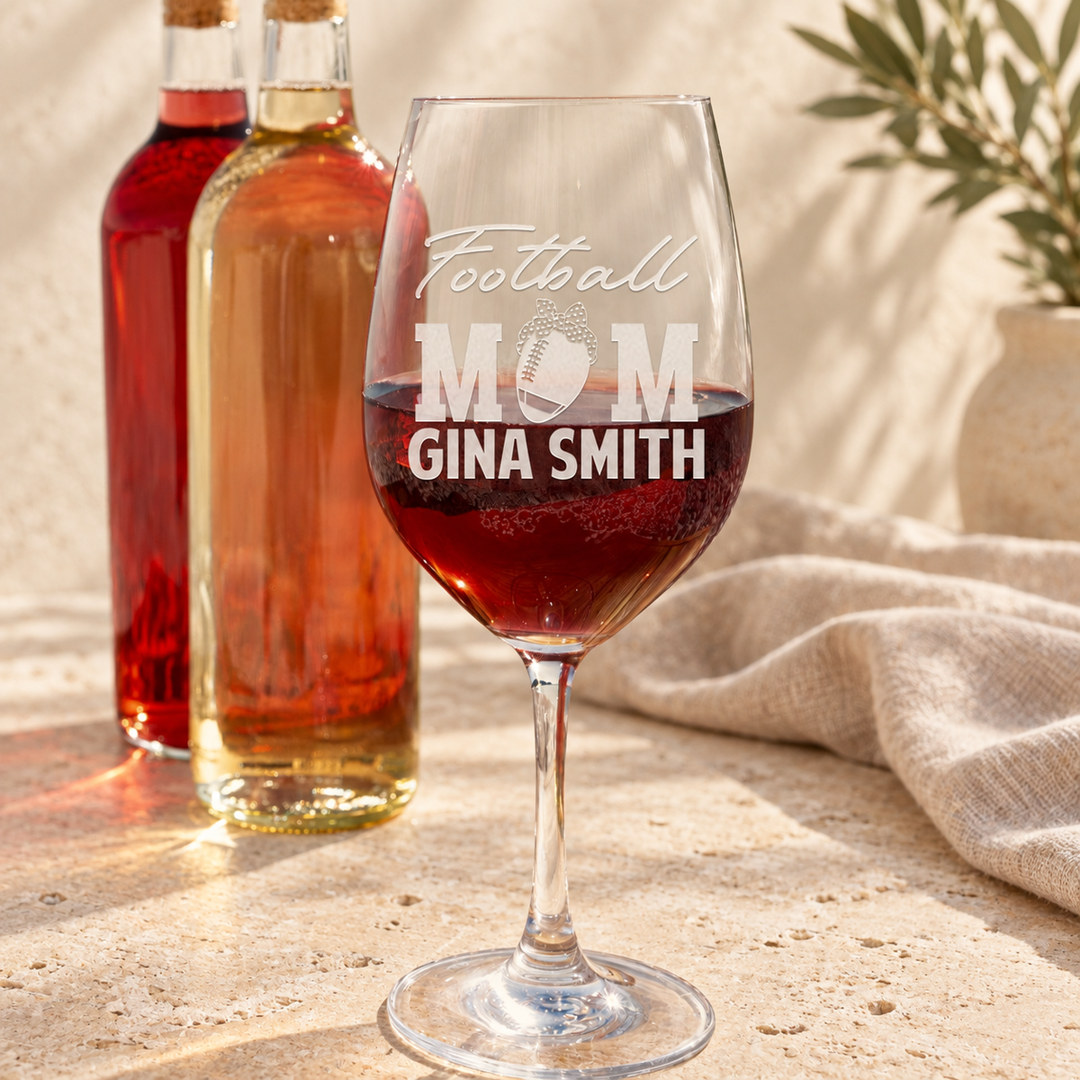 Personalized Wine Glass - "Football Mom" — editorial product photograph
