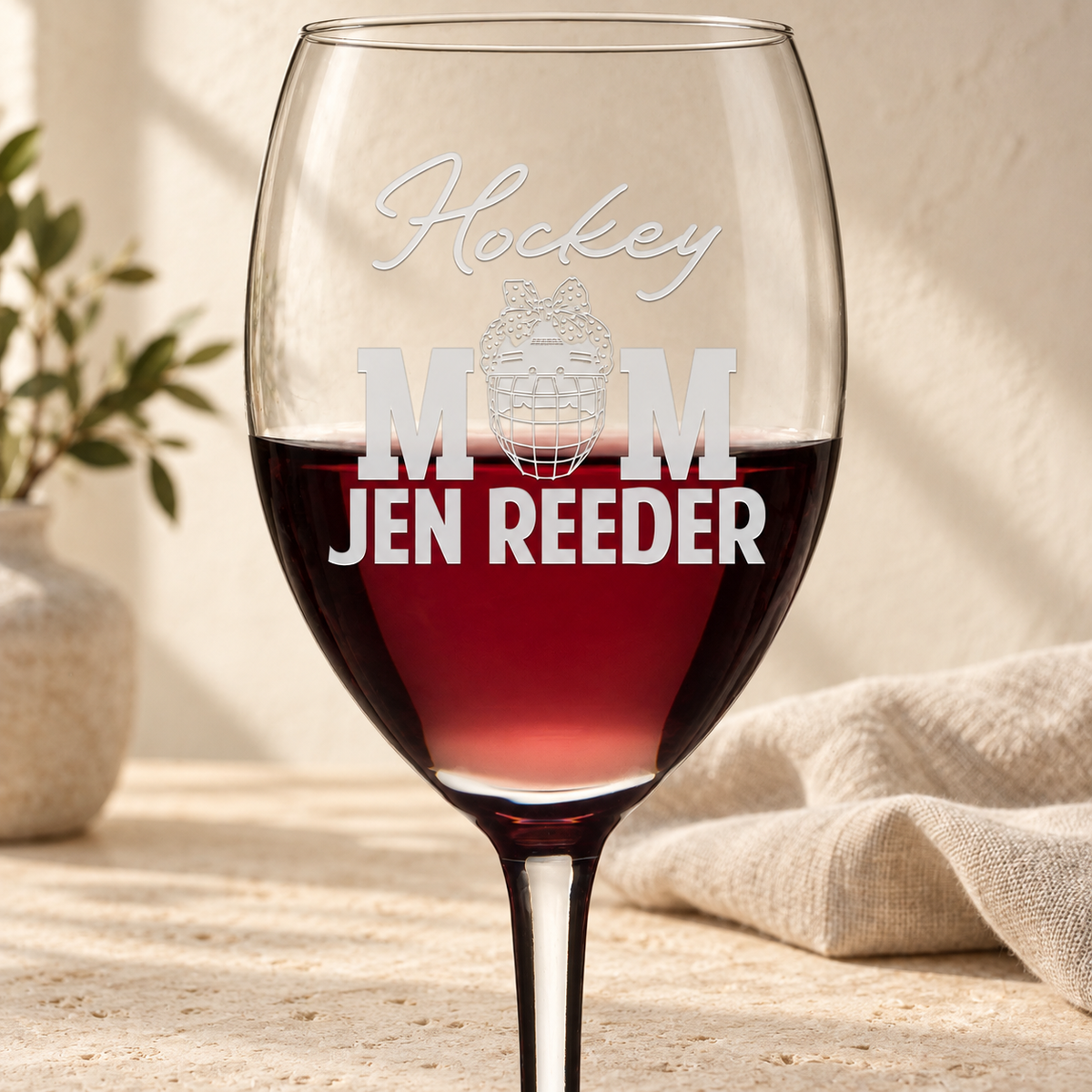 Personalized Wine Glass - "Hockey Mom" — editorial product photograph