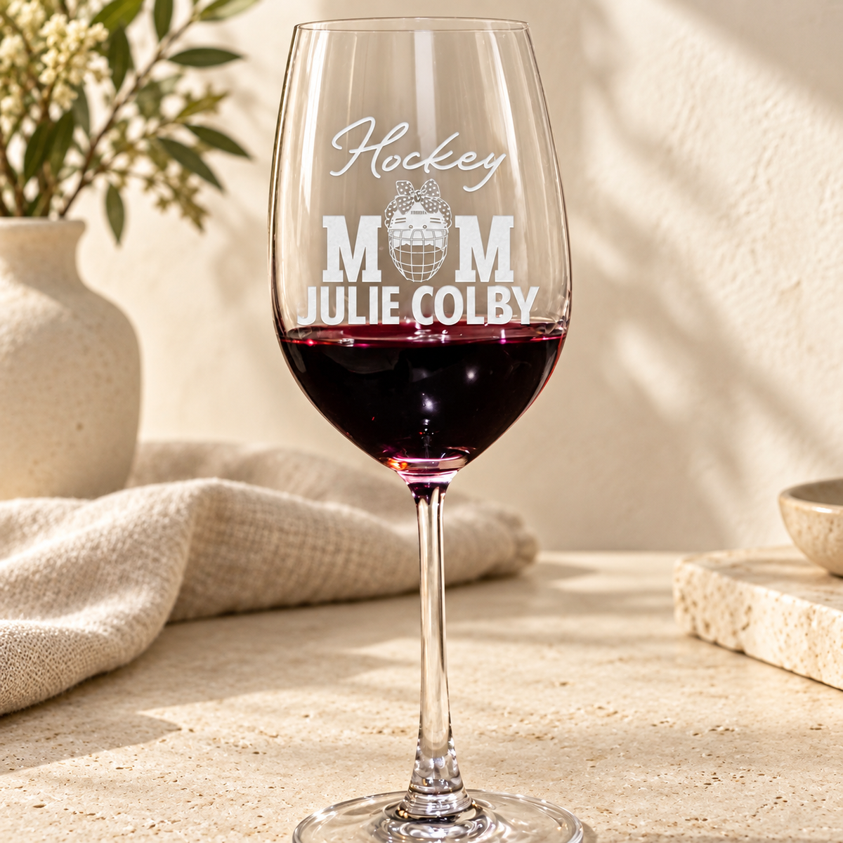 Personalized Wine Glass - "Hockey Mom" — editorial product photograph
