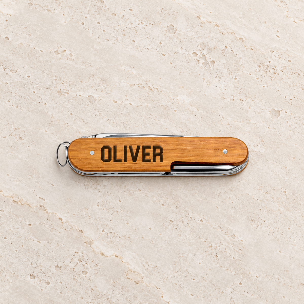 The Utility – Personalized Swiss Multi-Tool — editorial product photograph