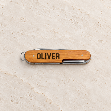 The Utility – Personalized Swiss Multi-Tool — editorial product photograph