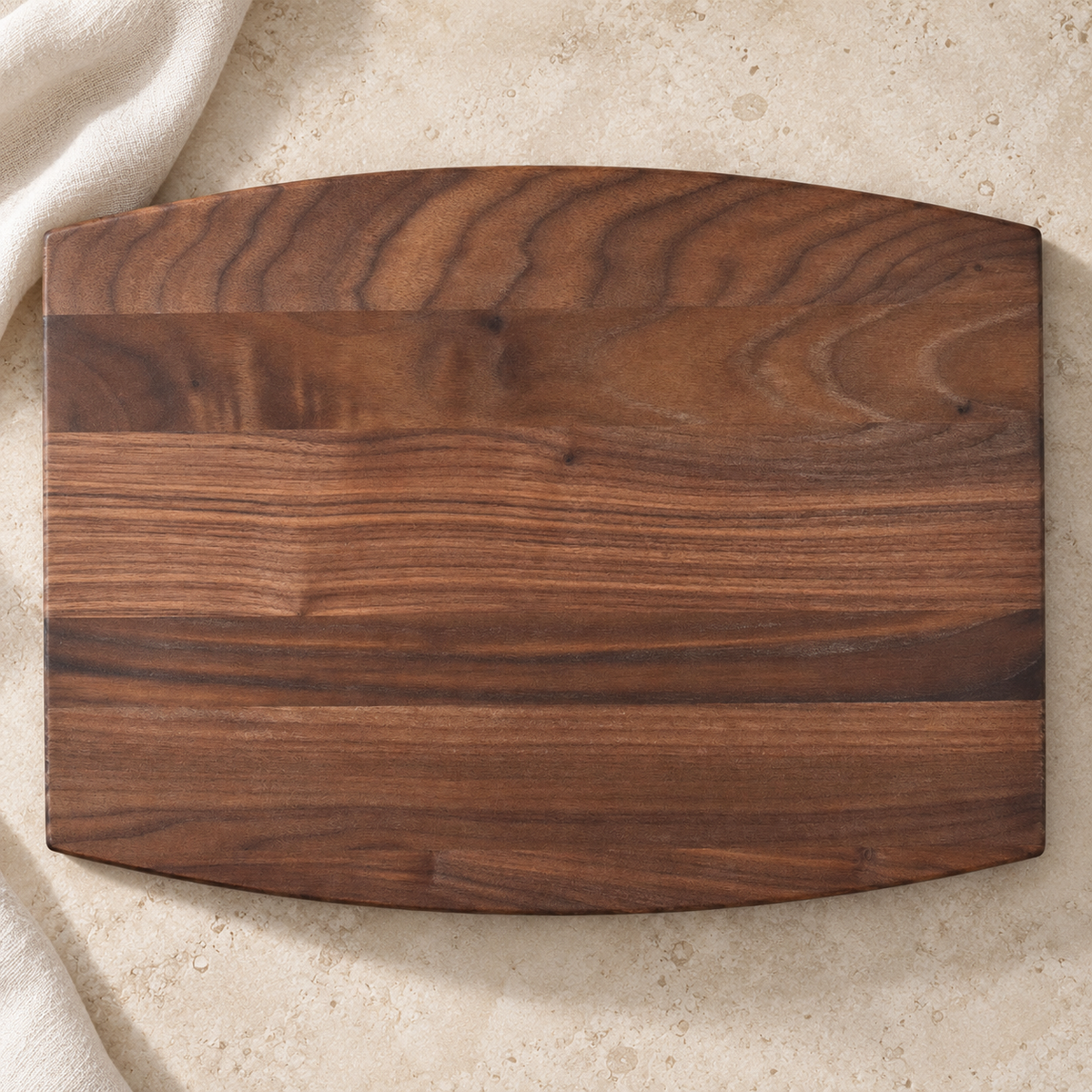 The Arched - Walnut - Small personalized cutting board, gallery view 3, photographed in natural light