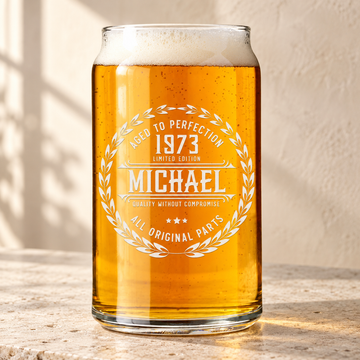 Personalized Beer Can Glass - "Aged To Perfection" — engraved detail, styled in natural daylight