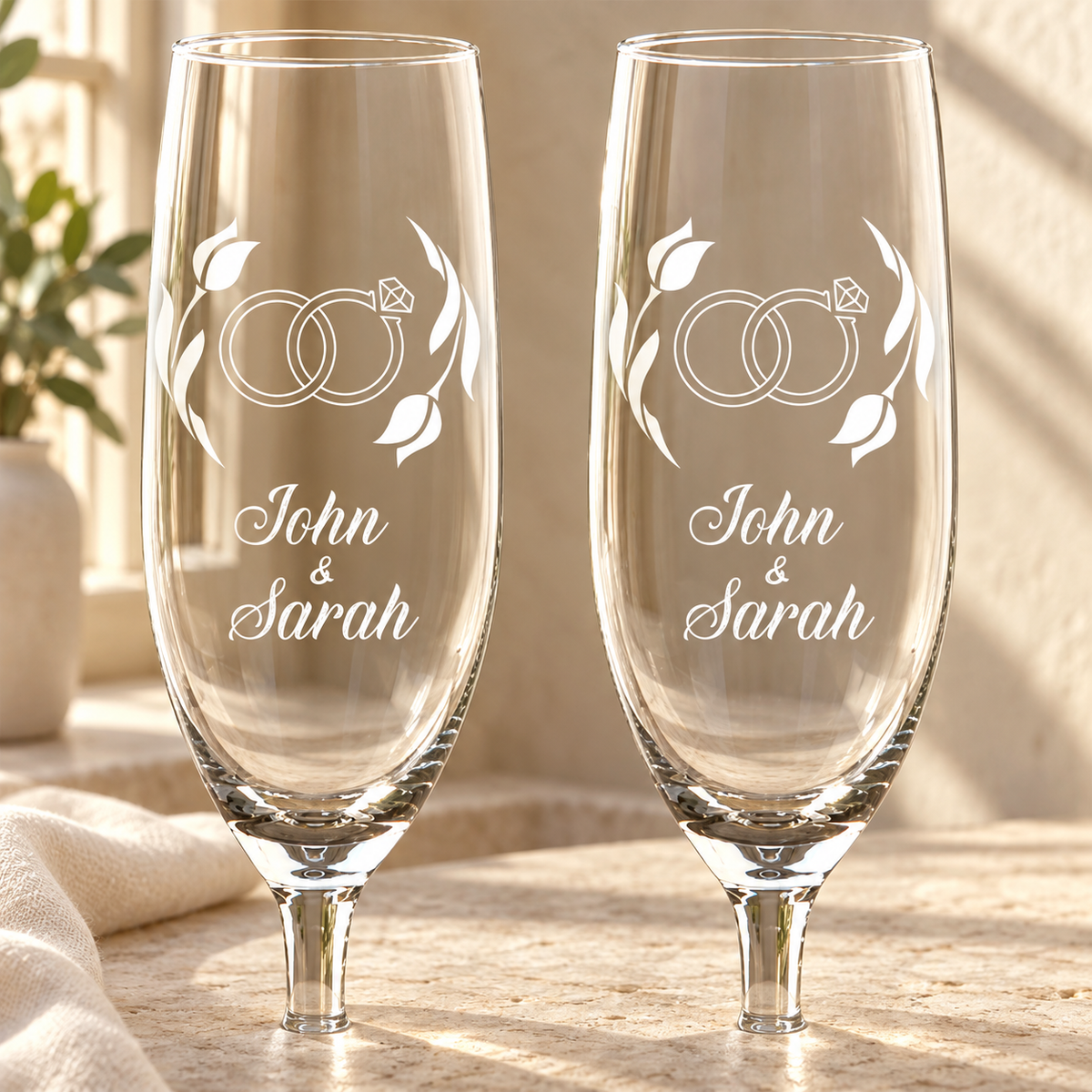 Personalized Champagne Flute Glass Set - "Engagement Rings" — engraved detail, styled in natural daylight