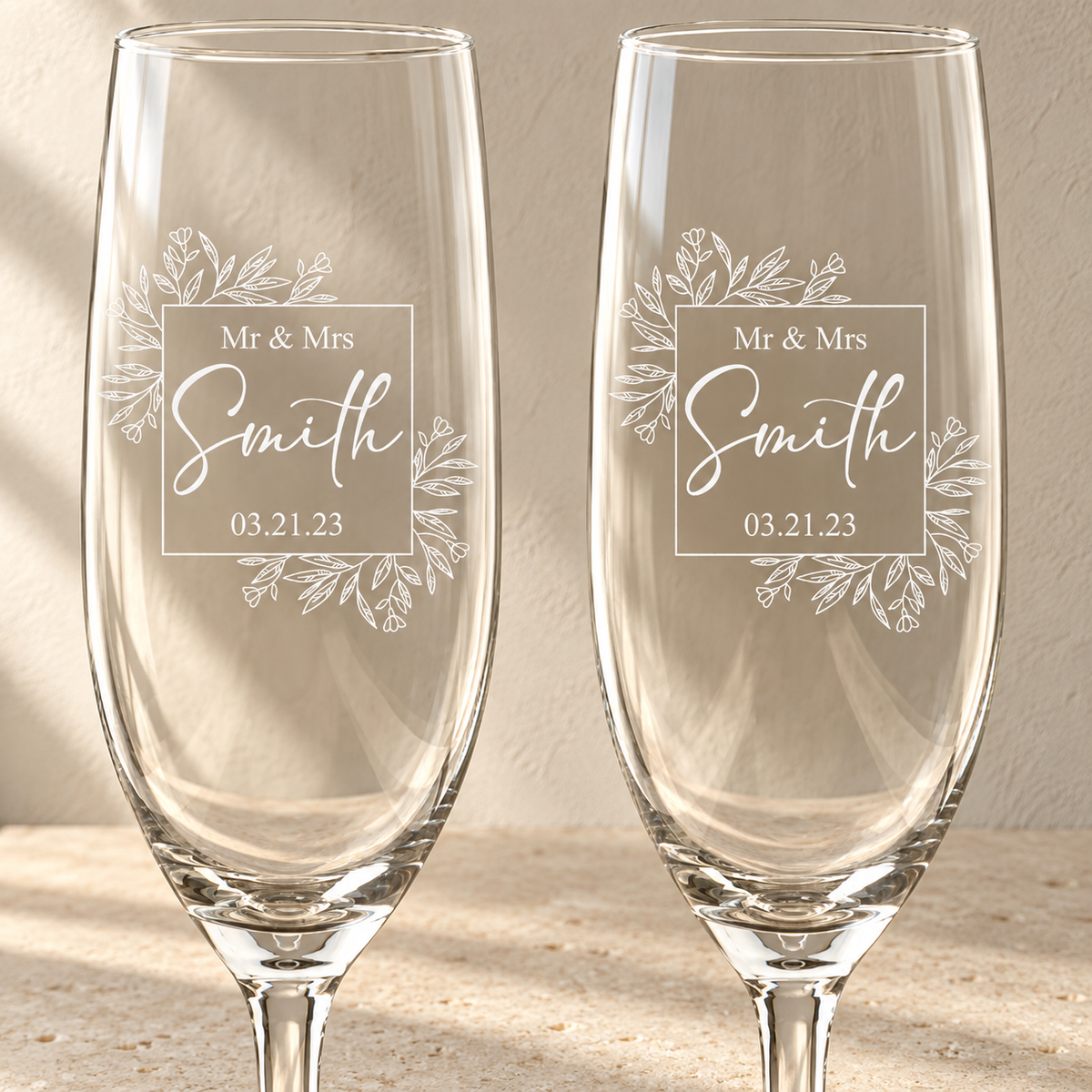Personalized Champagne Flute Glass Set - "Mr & Mrs" — engraved detail, styled in natural daylight