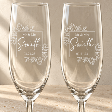 Personalized Champagne Flute Glass Set - "Mr & Mrs" — engraved detail, styled in natural daylight