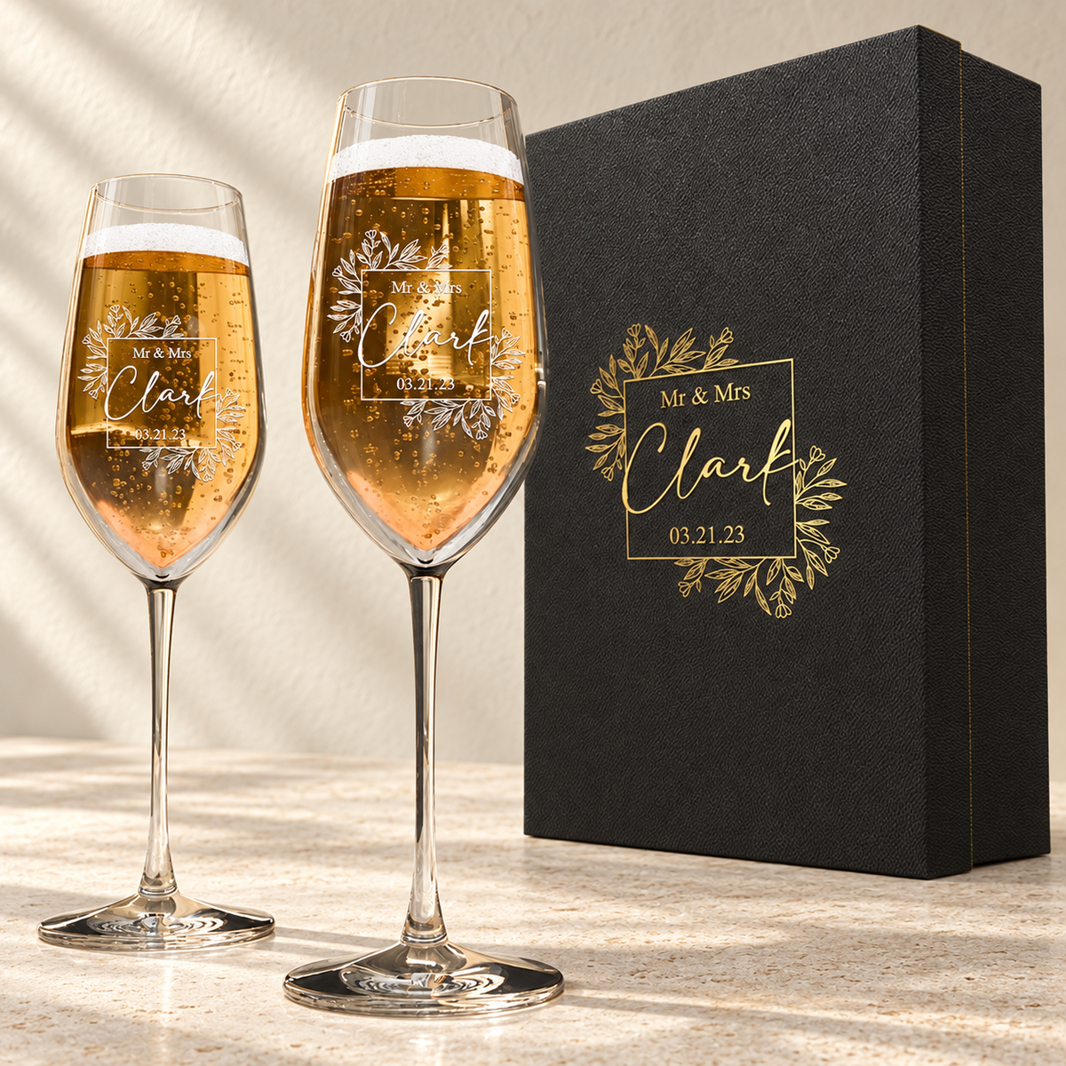 Personalized Champagne Flute Glass Set - "Mr & Mrs" — engraved detail, styled in natural daylight
