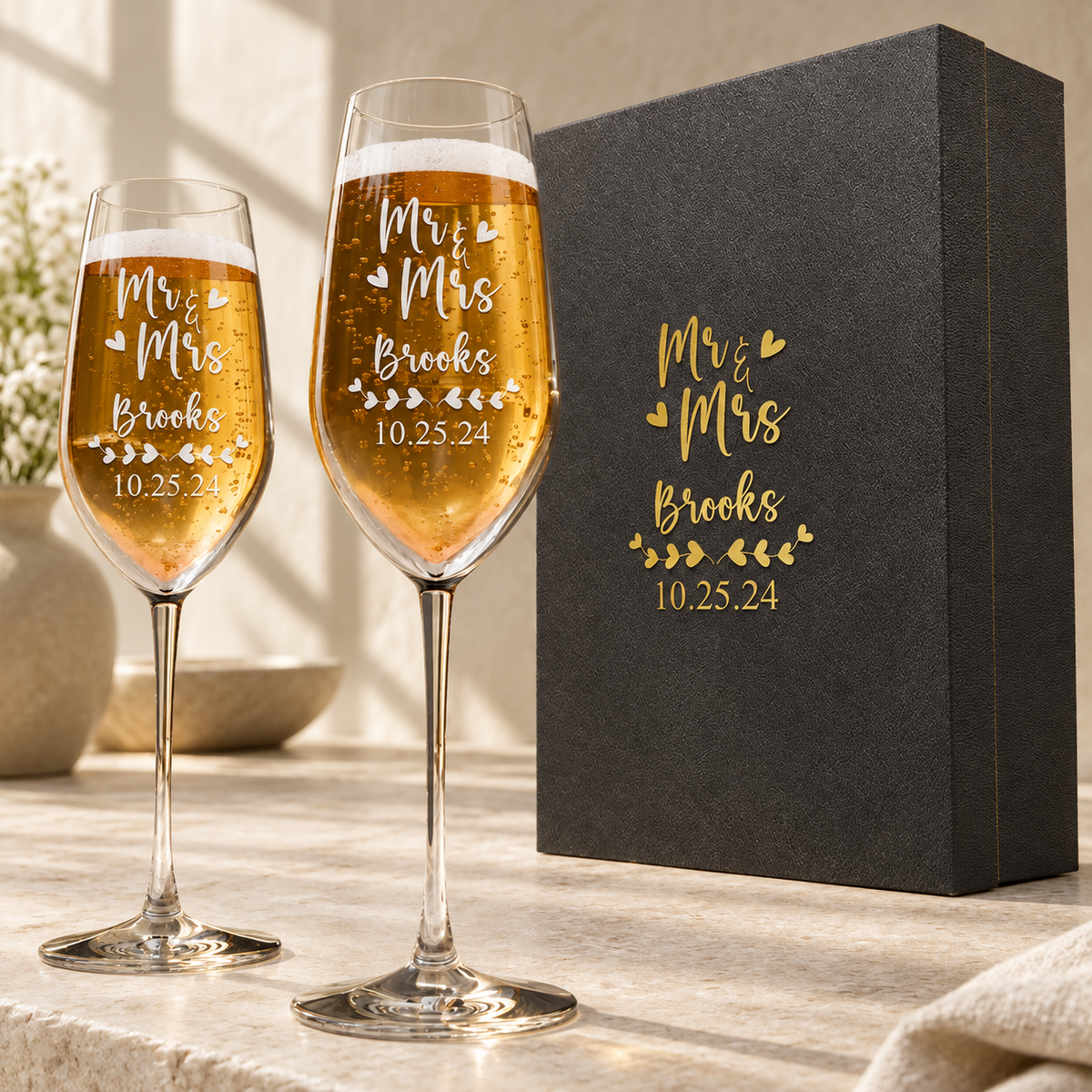 Personalized Champagne Flute Glass Set - "Mr & Mrs Hearts" — engraved detail, styled in natural daylight