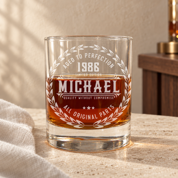 Personalized Michael old fashioned whiskey glass in warm natural light