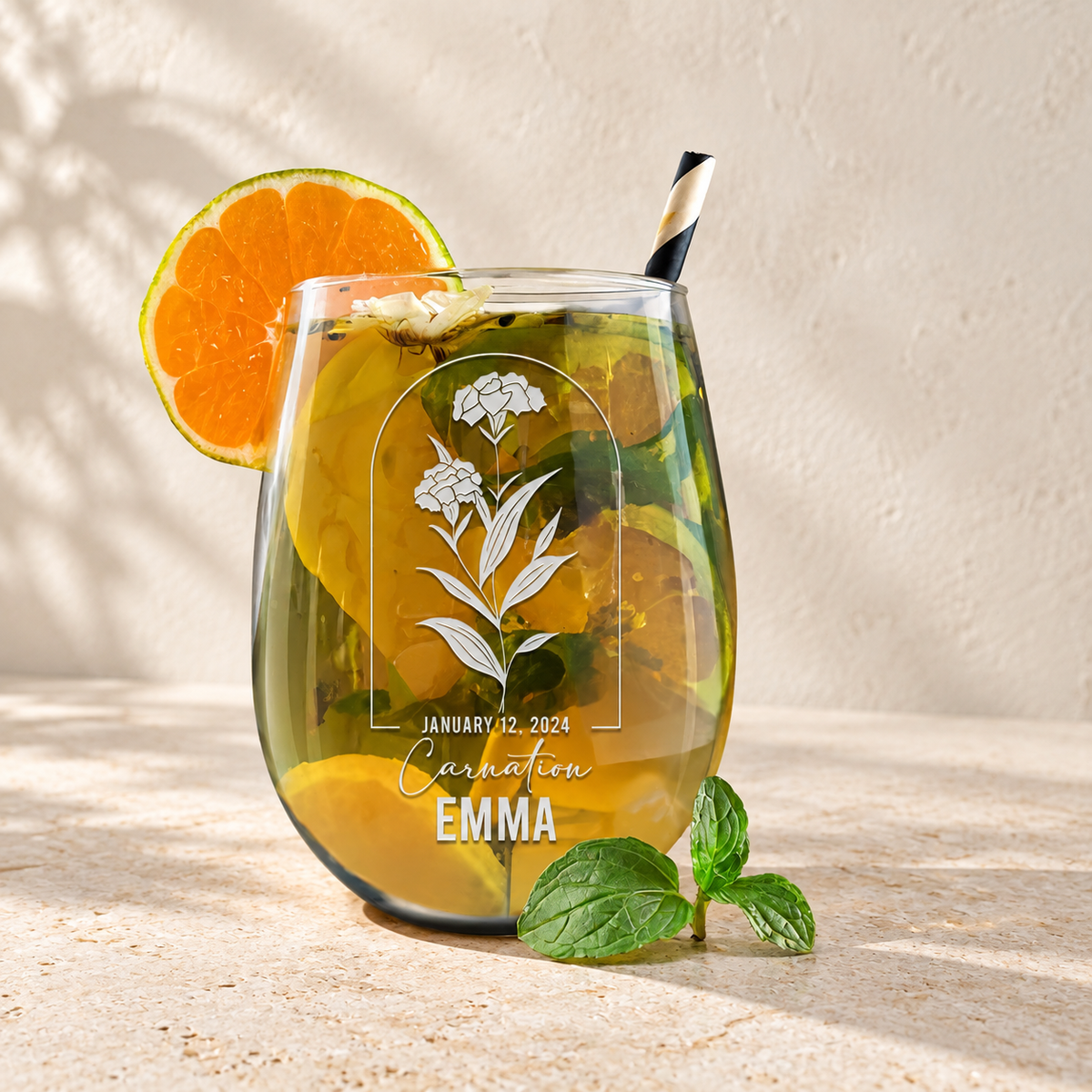 Personalized Stemless Wine Glass - Birth Flowers - "Carnation January" — editorial product photograph