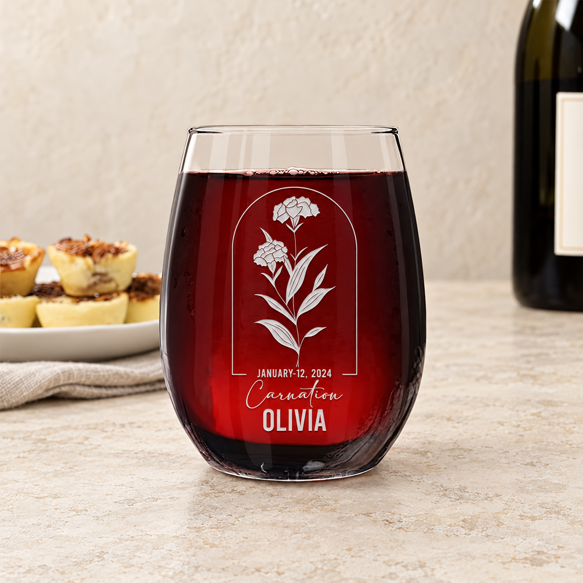 Personalized Stemless Wine Glass - Birth Flowers - "Carnation January" — editorial product photograph