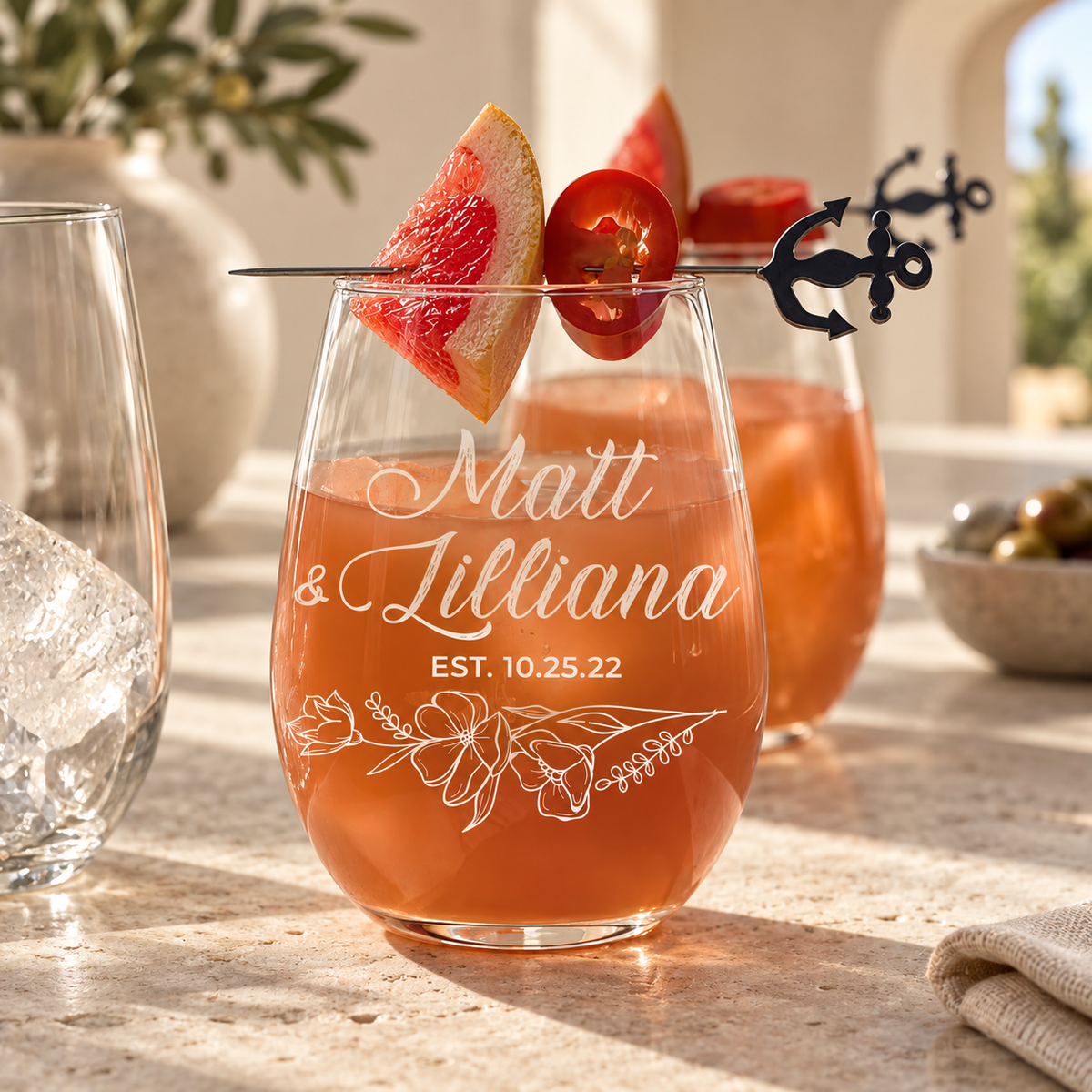 Personalized Stemless Wine Glass - "Floral Relationship Set" — engraved detail, styled in natural daylight
