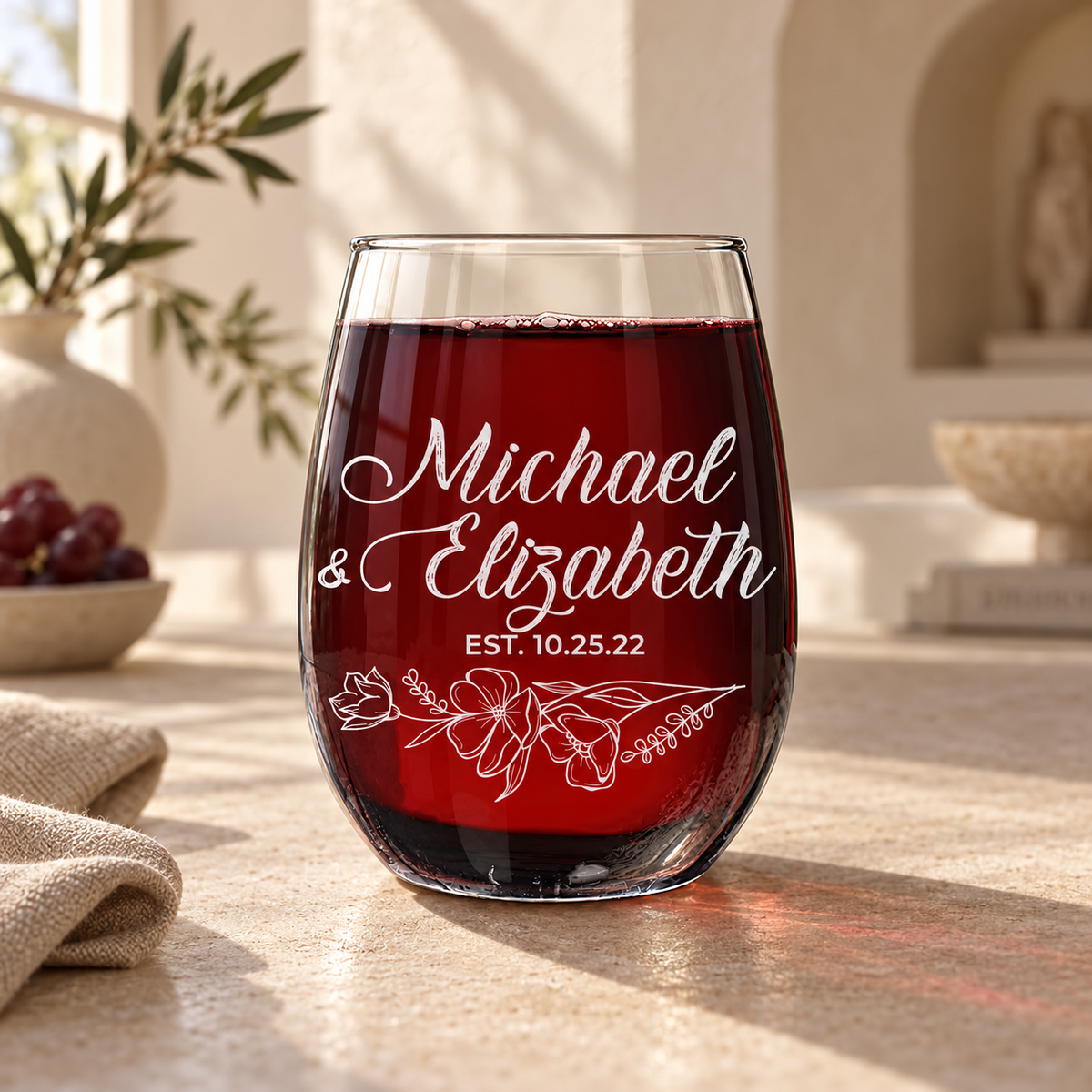 Personalized Stemless Wine Glass - "Floral Relationship Set" — engraved detail, styled in natural daylight