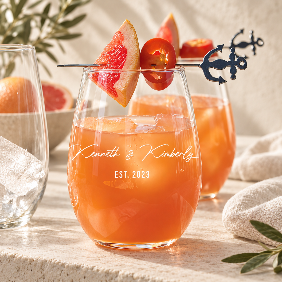 Personalized Stemless Wine Glass Set - "Couple's Names" — styled in natural daylight