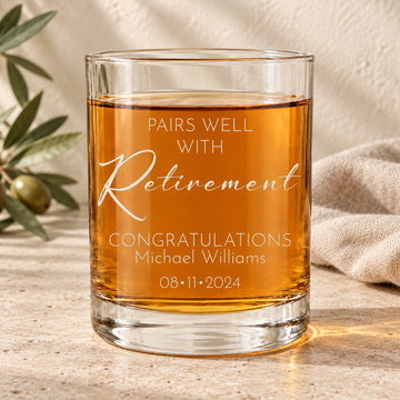 Personalized Whiskey Glass - "Pairs Well With Retirement" — personalized detail, styled in natural daylight