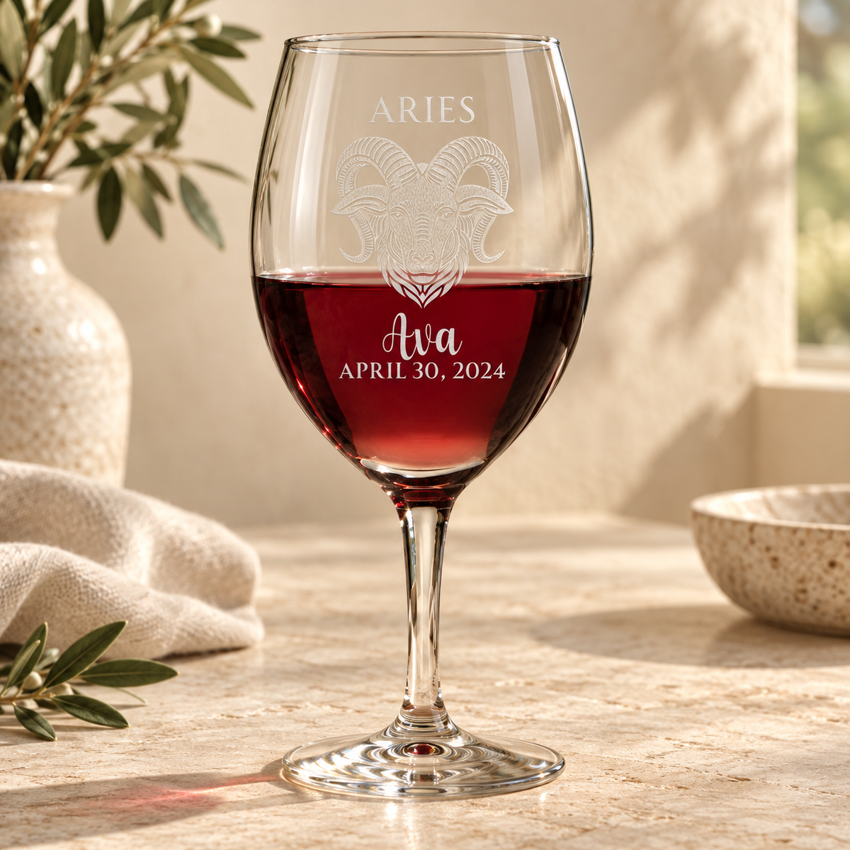 Personalized Wine Glass - Astrology - "ARIES" — engraved detail, styled in natural daylight