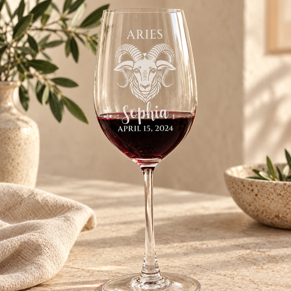 Personalized Wine Glass - Astrology - "ARIES" — engraved detail, styled in natural daylight