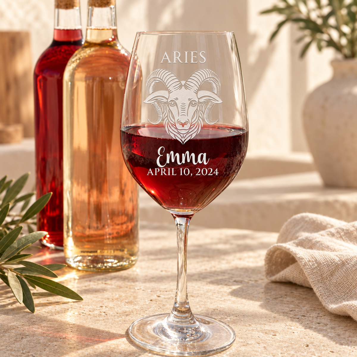 Personalized Wine Glass - Astrology - "ARIES" — engraved detail, styled in natural daylight