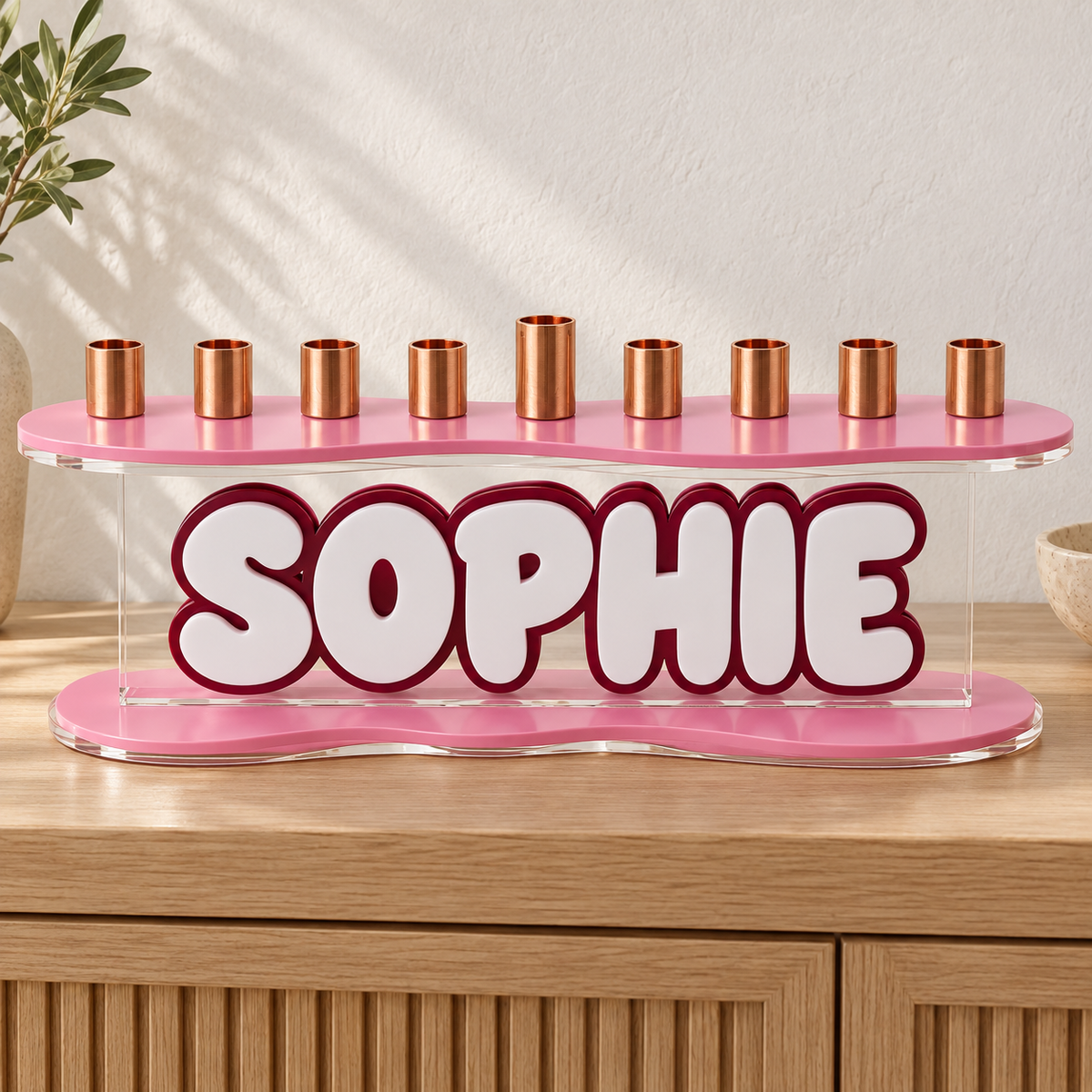 SOPHIE custom name menorah with pink curved top and base and burgundy outlined white letters