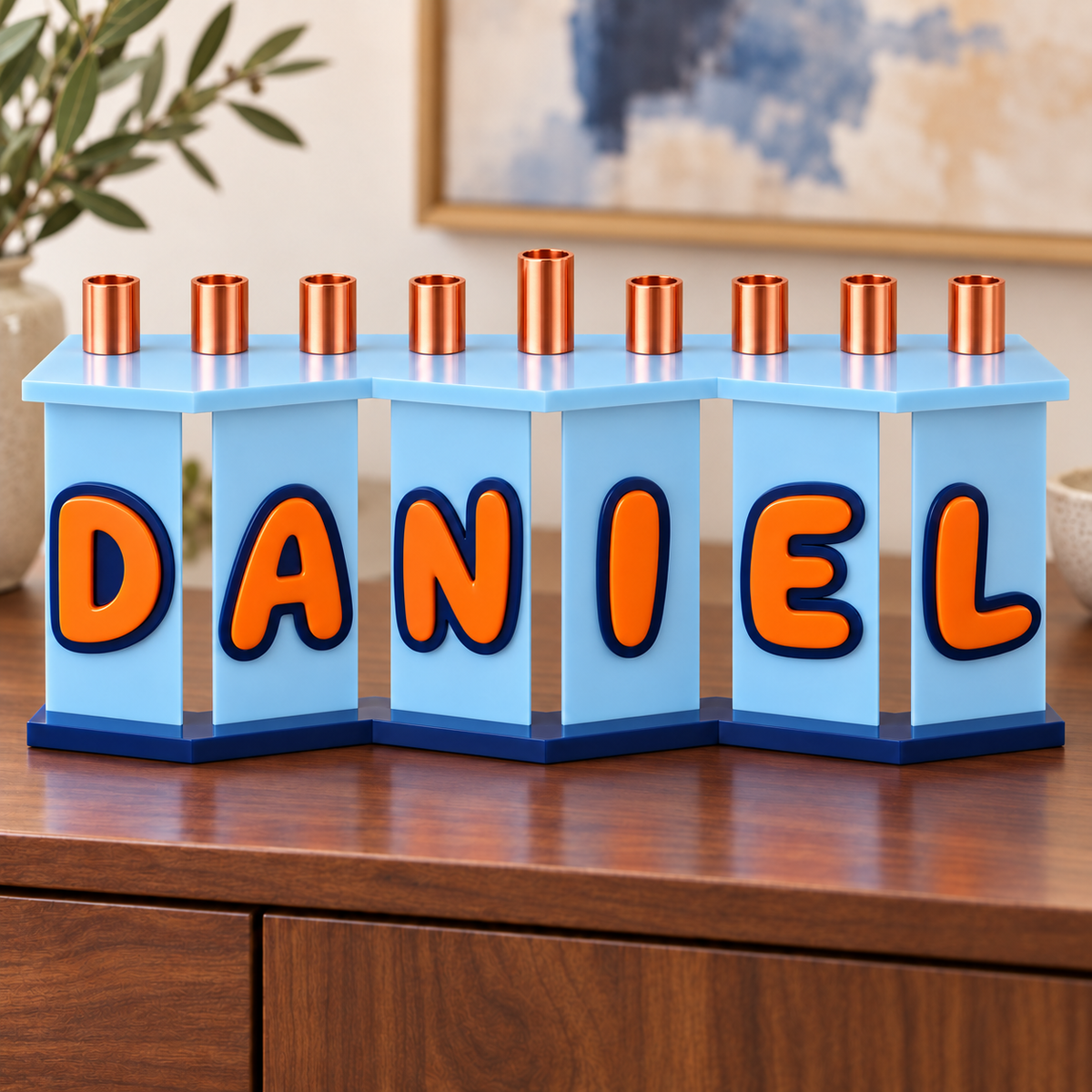 DANIEL acrylic menorah with opaque pale blue panels, orange letters and navy outlines