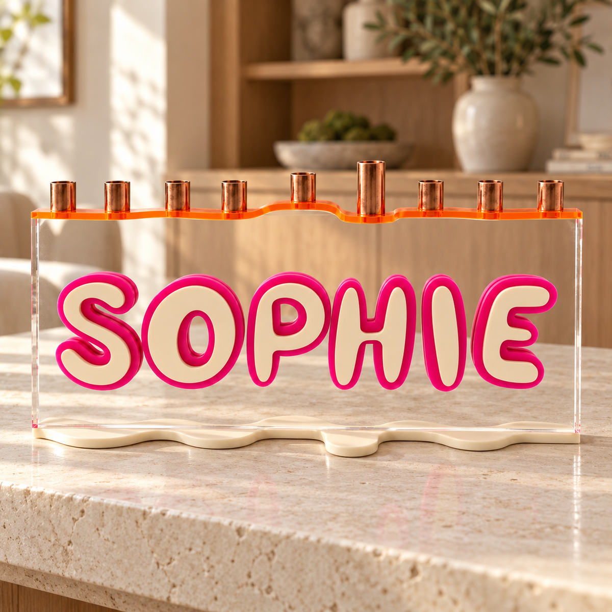 The Wave personalized acrylic menorah with SOPHIE in cream and pink, orange wavy top and copper cups