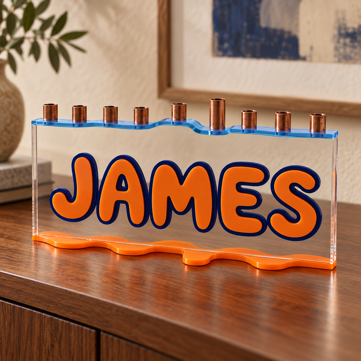 JAMES personalized menorah in Pool Club colors on a walnut console